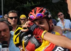 Cadel Evans crosses the finish line in tears. Photo copyright Fotoreporter Sirotti. Cadel Evans crosses the finish line in tears. Photo copyright Fotoreporter Sirotti.