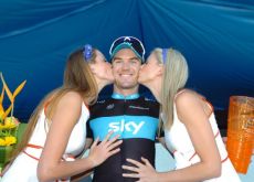 Chris Sutton (Team Sky) gets a treat from the podium girls. Photo copyright Fotoreporter Sirotti.