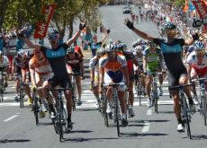 Chris Sutton wins and Team Sky teammate Greg Henderson celebrates the win. Photo copyright Fotoreporter Sirotti.