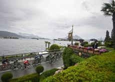 Cyclists pass by a lake during today's Giro d'Italia stage