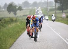 Cyclists riding in stage 1 of Criterium du Dauphine 2024