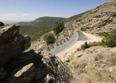 Cyclists on curved road in Vuelta a Espana