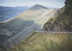 Cyclists and mountain peaks