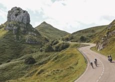 Cyclists passing by Spanish mountaintops