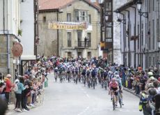 Cycling peloton in Spanish village at La Vuelta