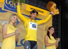 Fabain Cancellara has some quality time with the podium girls on the Tour de France podium. Can someone please send me the phone number of the left one? Wow! You're welcome to drop by! Photo copyright Fotoreporter Sirotti.