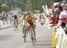 Janez Brajkovic_and Alberto Contador sprint toward the finish line. Photo copyright Fotoreporter Sirotti.