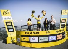 Jonas Vingegaard is celebrated on the podium as leader of Tour de France