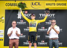 Jonas Vingegaard wearing the yellow jersey on the Tour de France podium