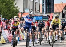 Julian Alaphilippe crosses the finish line as winner of stage 2 at Criterium du Dauphine 2023