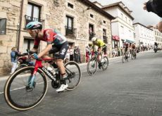 La Vuelta cyclists passing through Spanish village