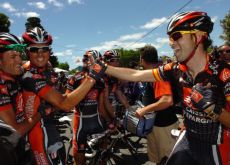 Luis Leon Sanchez celebrates his beautiful stage win with Alejandro Valverde and other teammates. Photo copyright Fotoreporter Sirotti.