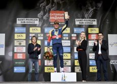 Mads Pedersen celebrated on the podium as winner of stage one at Criterium du Dauphine