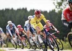 Mads Pedersen wearing yellow jersey