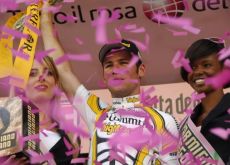 Mark Cavendish (Team Columbia-Highroad) on the podium with the beautiful podium girls. Photo copyright Fotoreporter Sirotti.