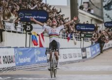 Mathieu Van der Poel crosses the finish line as winner of Paris-Roubaix 2024