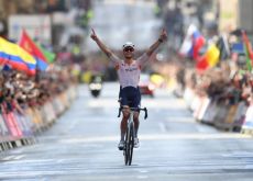 Mathieu van der Poel crosses the finish line as winner of the 2023 UCI World Championships Road Race in Glasgow