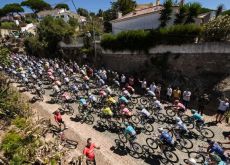 La Vuelta peloton climbing Portuguese hills