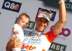 Philippe Gilbert celebrates his great win on the podium with his baby boy. Photo Fotoreporter Sirotti.