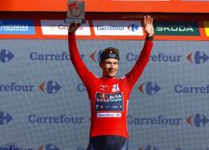 Primoz Roglic on the Vuelta a Espana podium in the red jersey