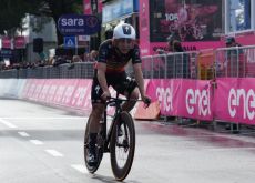 Remco Evenepoel crosses the finish line on his time trial bike
