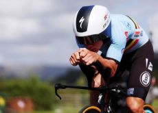 Remco Evenepoel in aerodynamic position on his Specialized time trial bike