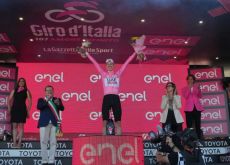 Tadej Pogacar in pink on the Giro d'Italia podium