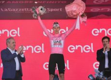 Tadej Pogacar celebrates race lead on Giro d'Italia podium