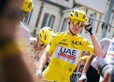 Tadej Pogacar smiling before the start of stage 9