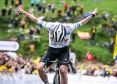 Tadej Pogacar crosses the finish line as winner of stage 6 at Tour de France 2023