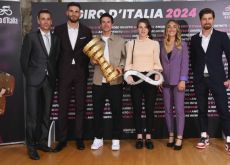 Professional cyclists with the Giro d'Italia trophies for 2024