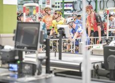 La Vuelta cyclists inside Carrefour supermarket